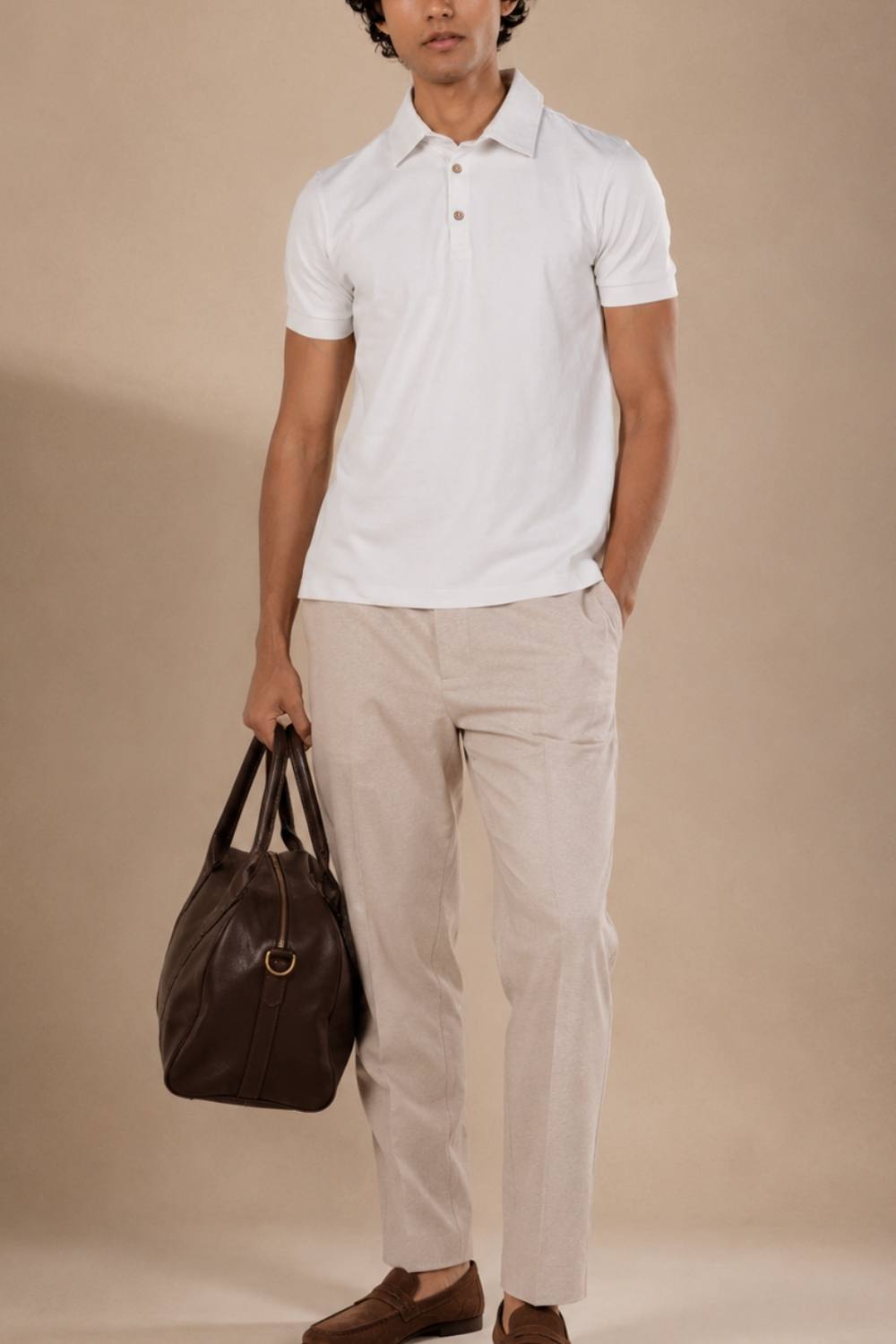 Man wearing an off-white heavyweight Sorona polo t-shirt, front view — Nimbus Cloud